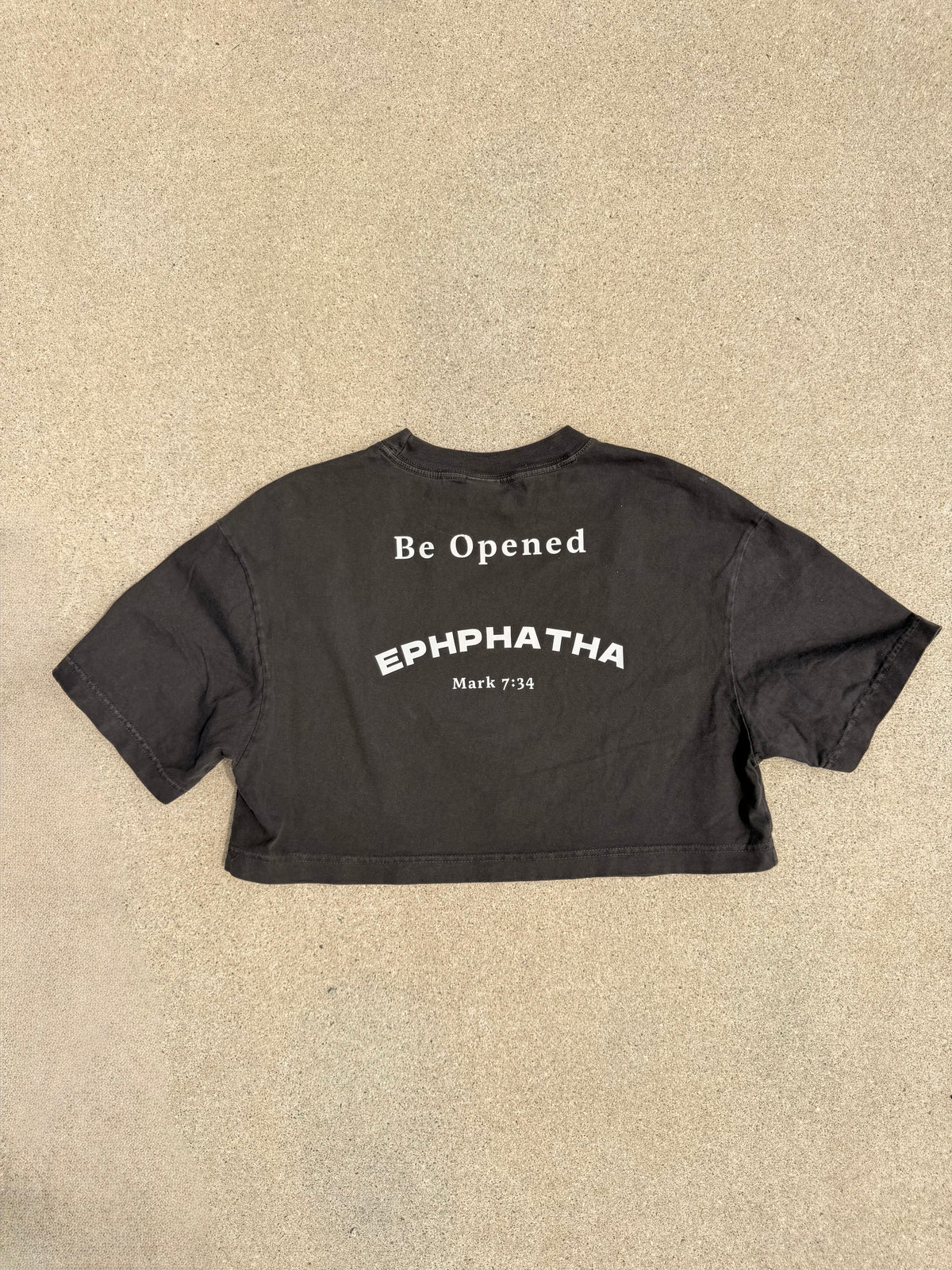 Ephphatha Mark 7:34 design detail on black Christian crop tee